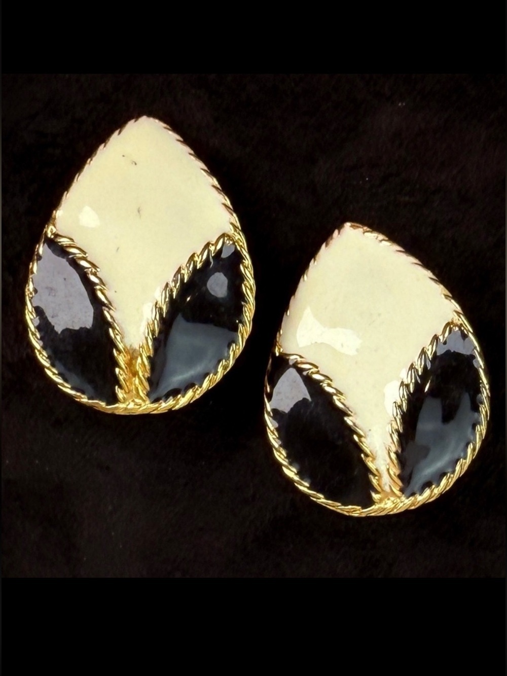 Vintage goldtone, black and cream enamel clip on earrings